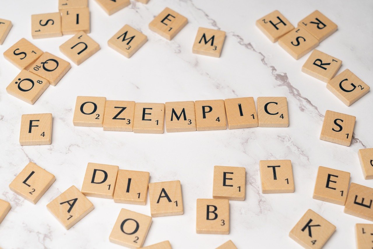 906 Biggesdt little name in medicine scrabble tiles spelling ozempic